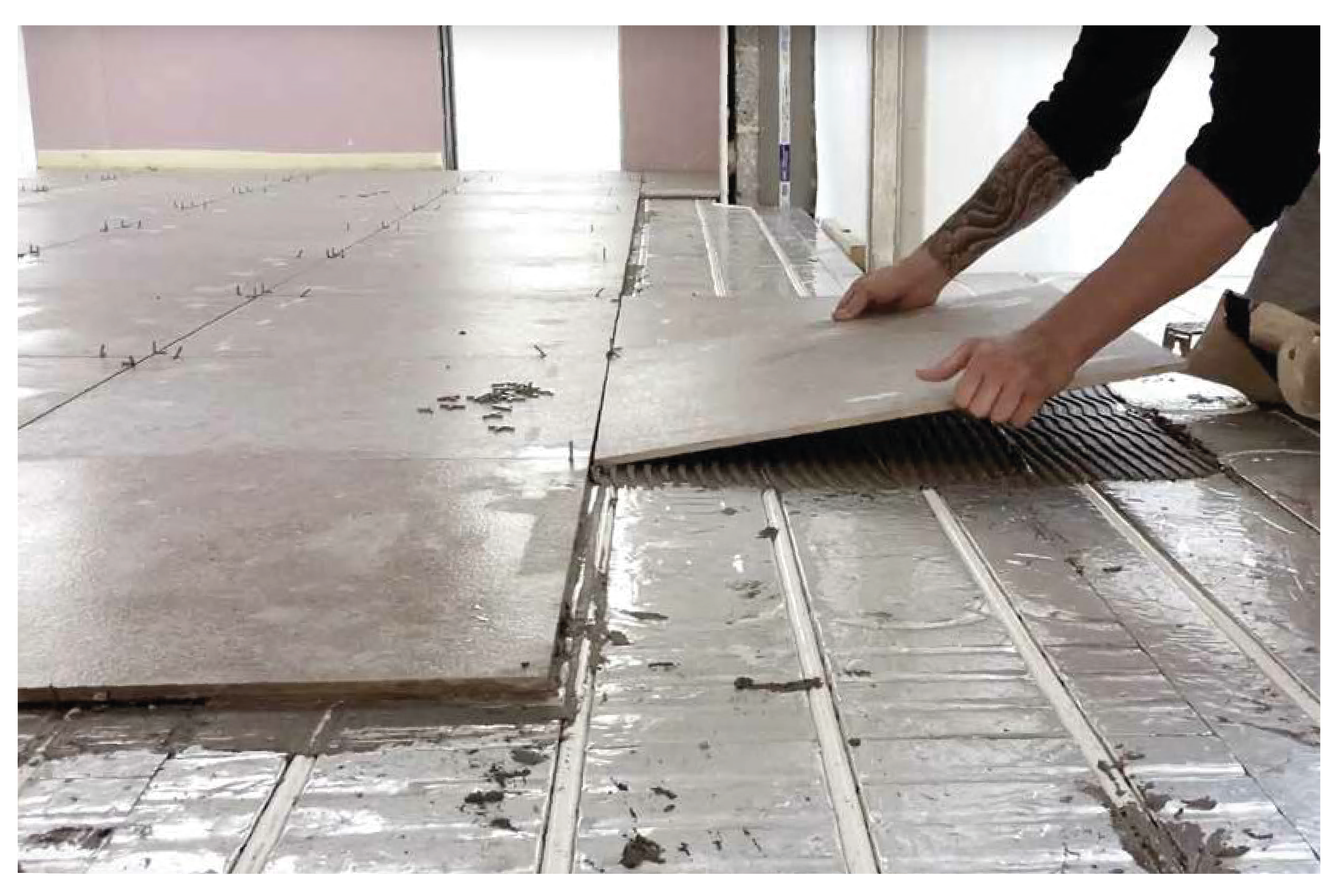 Tiles going down on Wunda Underfloor heating panels
